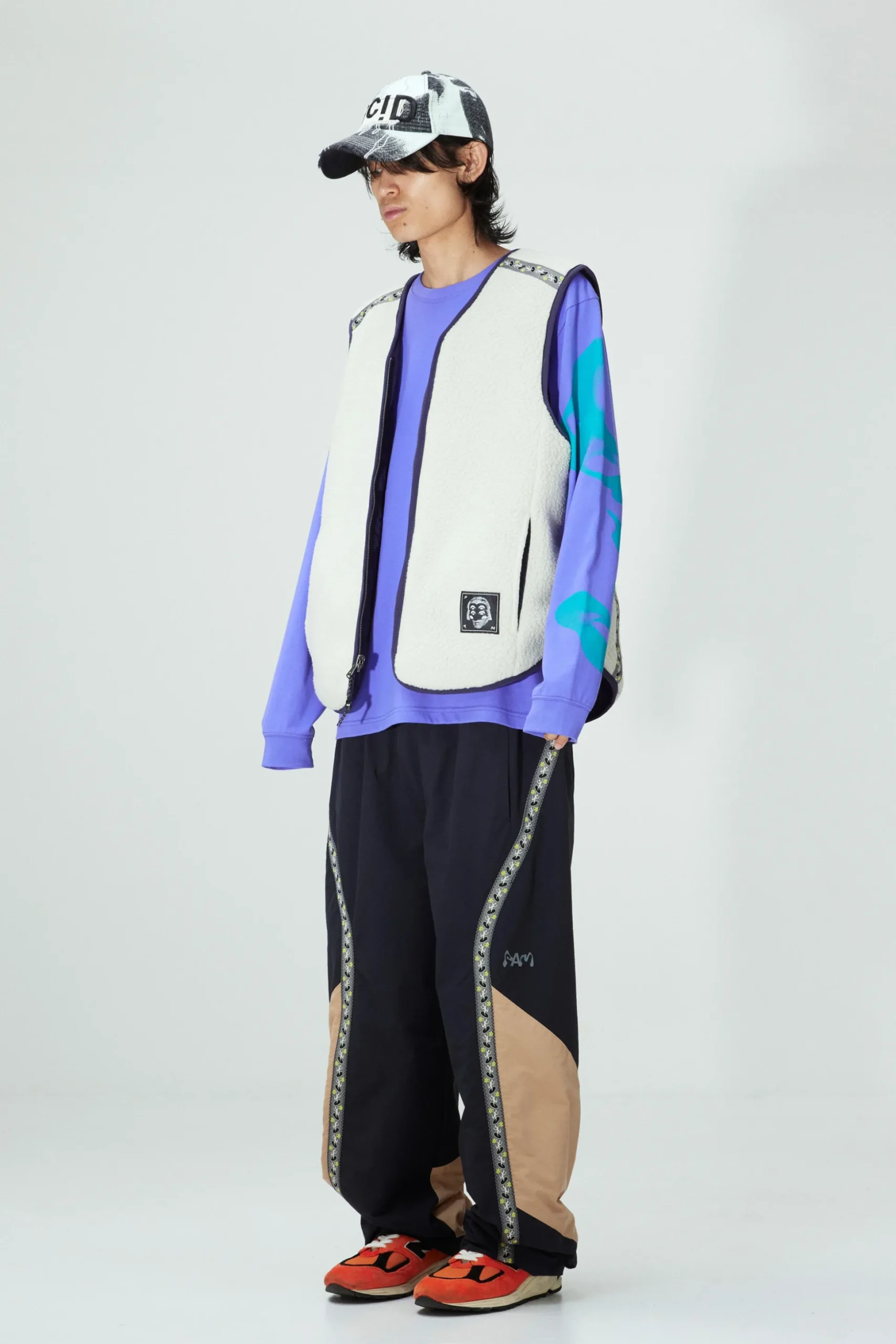 PENCHANT REVERSIBLE VEST